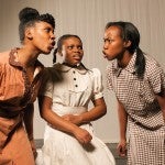 iera Alexander, Chiagoziem Nwakanma, and Jazzlyn Luckett in a scene from "The Bluest Eye"