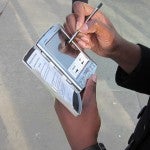 Person holding a palm pilot