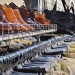 Shoes and pants at a thrift store