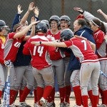 Softball team celebrating