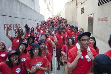 students entering the pavilion for convocation