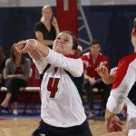 MaryKate Imrie passing the volleyball