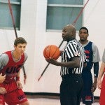 Referee prepared for tip-off