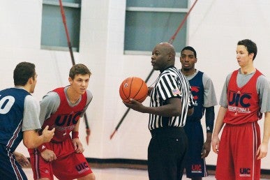 Referee prepared for tip-off