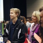 High school student speaking with UIC member