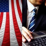 American flag and photo of man in tie at keyboard