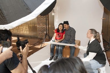 Father and daughter having photo taken