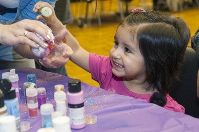 Livia Villarreal making crafts