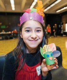 Emelice Hernandez holding turkey place card