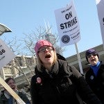 Faculty, students, and supporters rally during the faculty protest