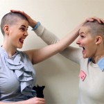 Young women with shaved heads