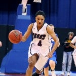 Rachel Story leads her teammates down the court