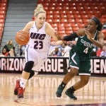 Emily Kobel pushes past a Cleveland player