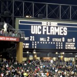U.S. Cellular Field scoreboard reading "UIC FLAMES"