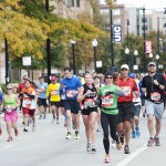 Chicago Marathon runners pass the UIC campus