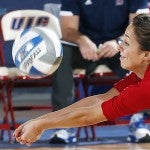 Maggie Strus dives for the volleyball