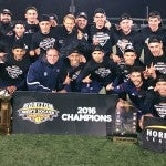 Men's Soccer team posing for Horizon League championship photo