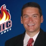 UIC Flames logo and Garrett Klassy portrait