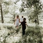 children running in a field