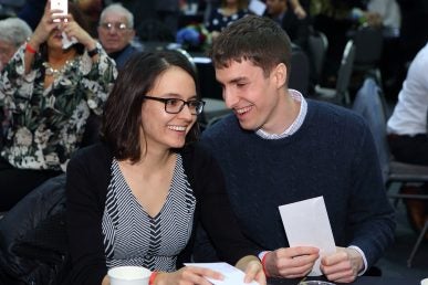 couple waiting to open their results