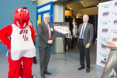 Chancellor Michael Amiridis and Paul Simons