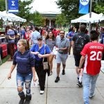 Students and patrons waking through event