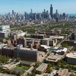 Aerial view of campus and skyline