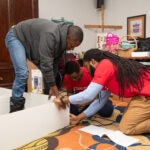 UIC students build a bookcase during a service activity on Jan. 20, 2020.