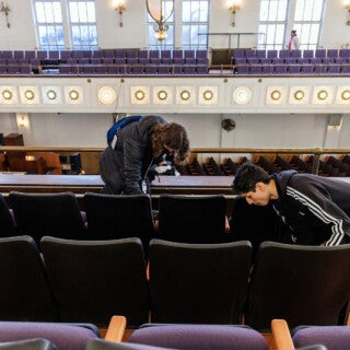 For the 2025 MLK Jr. Day of Service, UIC students cleaned and picked up trash at Stone Temple Baptist Church in Lawndale. (Photo: Creative and Digital Services) students clean chairs at a church