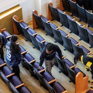 For the 2025 MLK Jr. Day of Service, UIC students cleaned and picked up trash at Stone Temple Baptist Church in Lawndale. (Photo: Creative and Digital Services) students clean chairs at a church